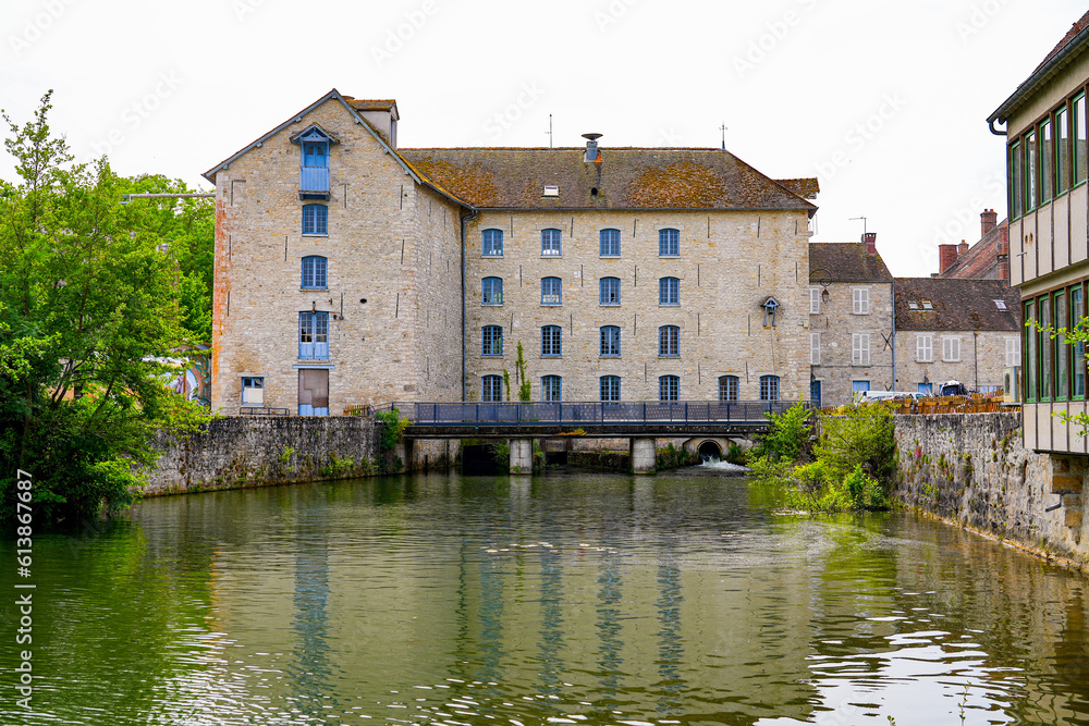 Old flour water mill built along the Loing river in Nemours, a small town in the south of the Seine et Marne department in Paris region, France