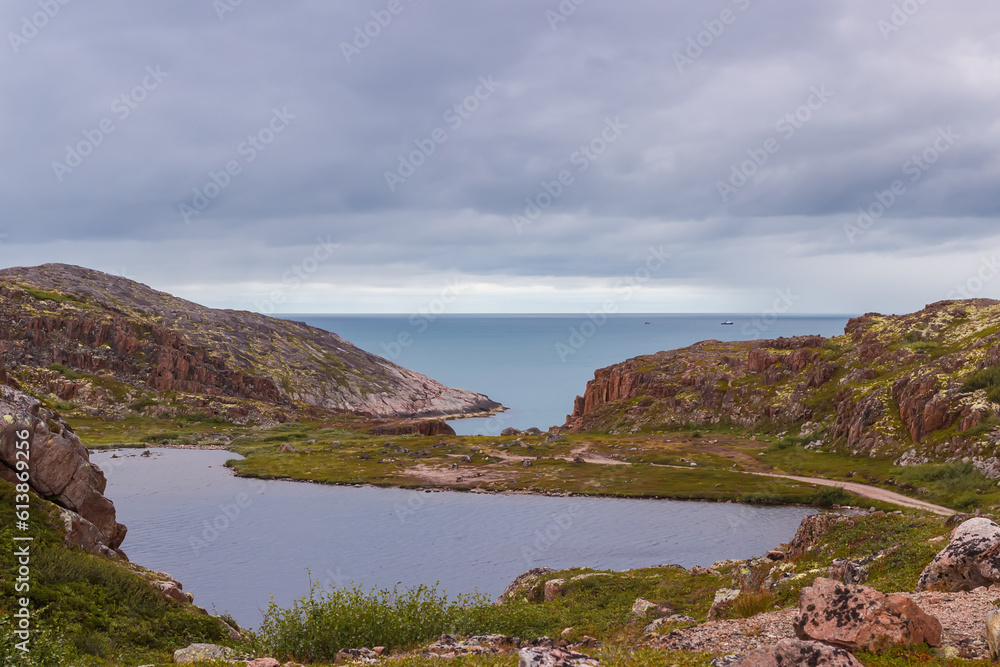 The view of the lake and the Barents Sea in Teriberke