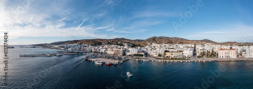 Greece Tinos island Hora town Cyclades. Aerial drone panoramic view of port, sea blue sky. Banner