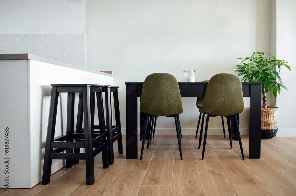 Dining room interior with dining zone and bar stools Dining room interior with dining zone and bar stools