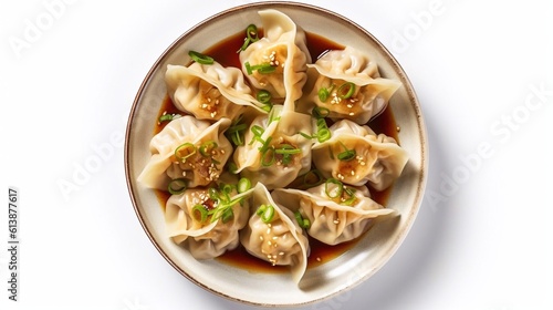 Traditional japaneese gyoza dumplings with  chopped green onions and sesame seeds in ceramic plate on wooden table. Top view. AI generated photo