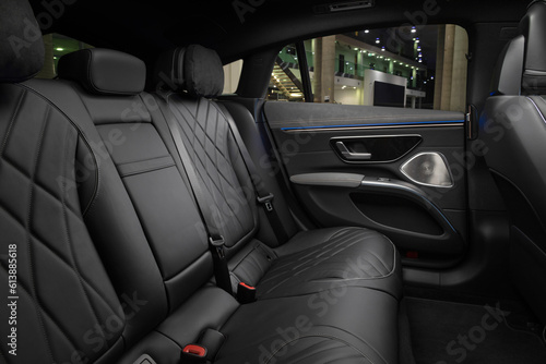 interior of a luxury car with black leather seats © Bartek