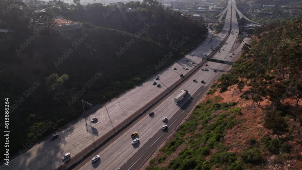 Interstate 805 multi lane highway road system with cars and vehicle traffic from aerial drone establishing shot from above outside city of San Diego, California Interstate 805 multi lane highway road system with cars and vehicle traffic from aerial drone establishing shot from above outside city of San Diego, California