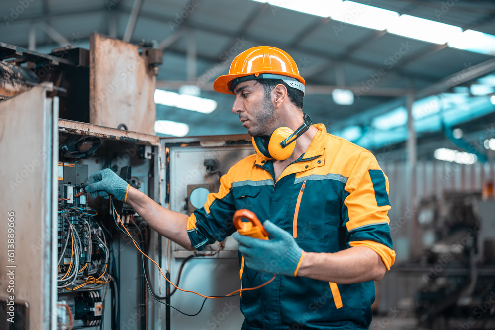 Electrical technician tests wiring, polarity, grounding, voltages and
