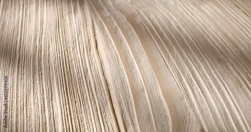 Brushed wood. The surface of aged wood with a metal brush. Close up. Angle view.