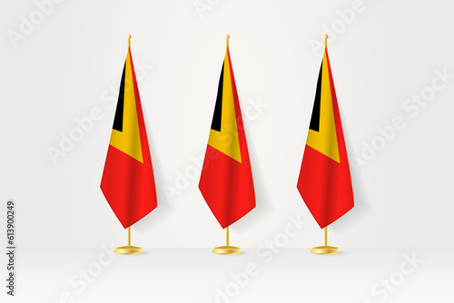 Three East Timor flags in a row on a golden stand, illustration of press conference and other meetings.