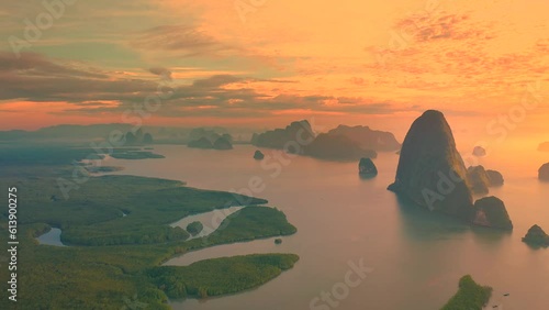 Scenic landscape with sea and mountains in Phang Nga bay at sunrise. Samet Nangshe viewpoint. Amazing wild nature of Asia. Aerial drone view 4K. photo