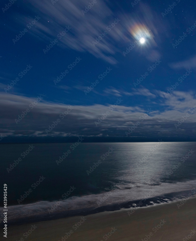 Fototapeta premium Moon that is over the water at Myrtle Beach