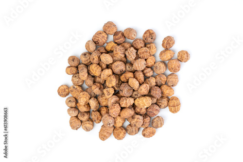 Top view of a bunch of tiger nuts on a white background.