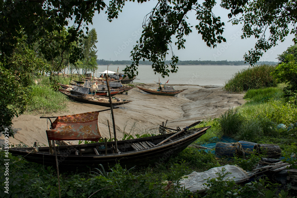 Few fishing boats anchored on the bank of river Ganga for taking rest. Few fishing boats anchored on the bank of river Ganga for taking rest.