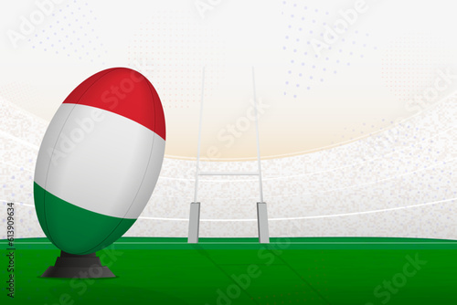Italy national team rugby ball on rugby stadium and goal posts  preparing for a penalty or free kick.