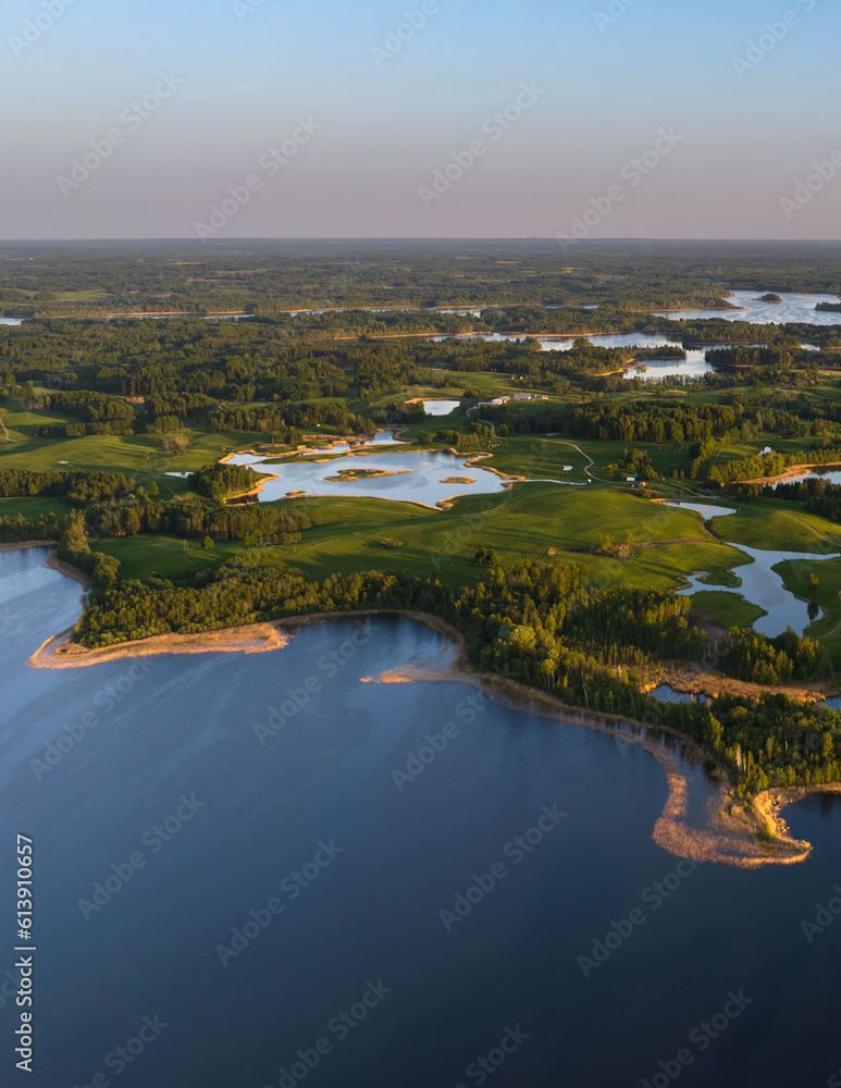 Sunset time bay lake Siver Nature of Latvia, Latgale.