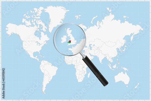 Magnifying glass showing a map of Wales on a world map.