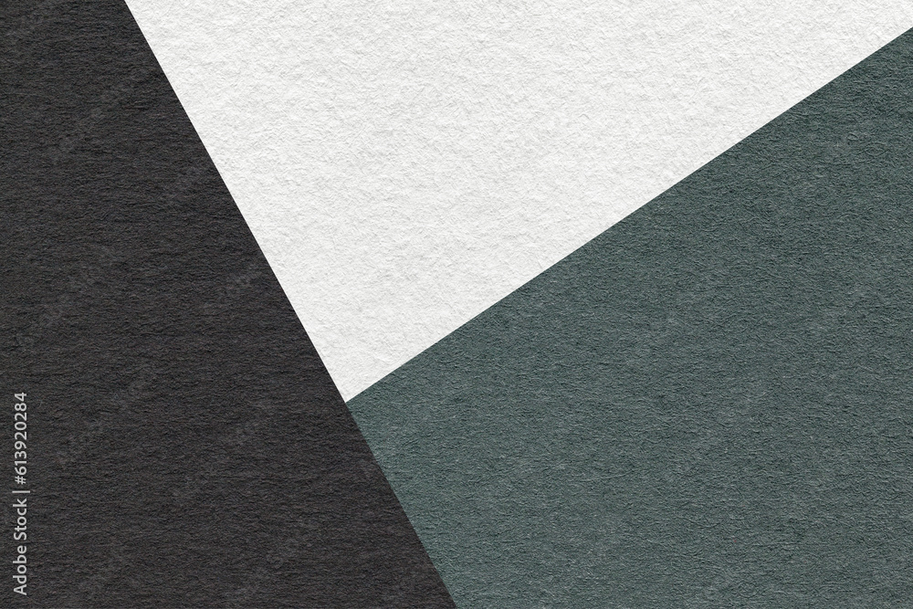 Texture of craft black, white and dark green shade color paper background, macro. Vintage abstract teal cardboard Texture of craft black, white and dark green shade color paper background, macro. Vintage abstract teal cardboard