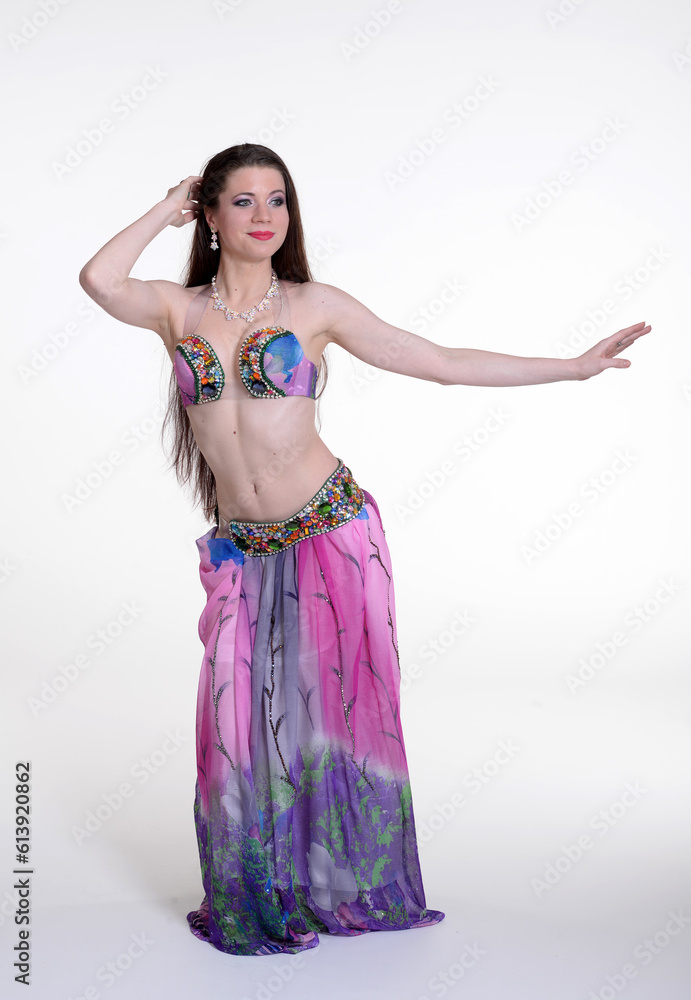 Belly dancer woman studio photography, belly dance is an art form of the dance. Belly dancer woman studio photography, belly dance is an art form of the dance.