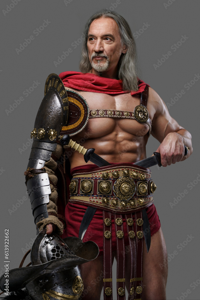 Distinguished gladiator with a stylish silver beard and luscious locks