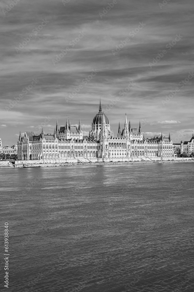 Fototapeta premium Budapest, Hungary: The Hungarian Parliament Building, seat of the National Assembly of Hungary on the Danube river waterfront in black and white