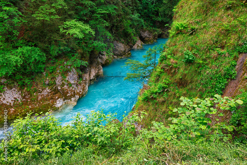 Summer scenic view of Tolmin Gorges. Majestic scenery with clean mountain river in the deep gorges of Tolmin, Slovenia, Europe 