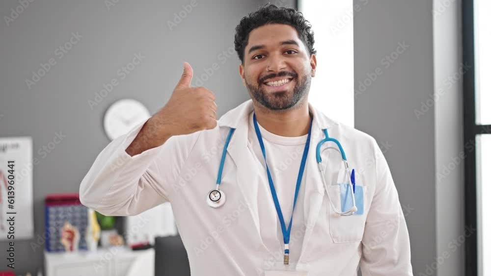 African american man doctor doing thumb up at clinic African american man doctor doing thumb up at clinic