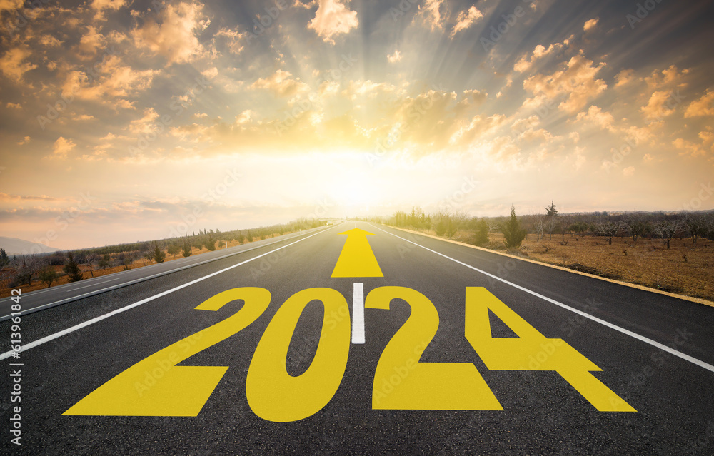 The word 2024 written on the highway. 2024 target indicated by arrow on