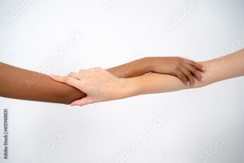 Two Hands Holding with Different Skin Type