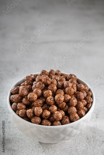 Bowl with cereal chocolate balls.