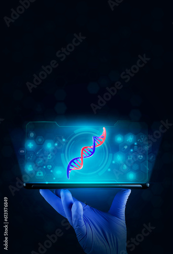 DNA molecule. Biotechnology and modern medicine. The doctor's hand holds a tablet. A chromosomal analysis of genetic DNA is projected. On digital dark background. Science and Technology.