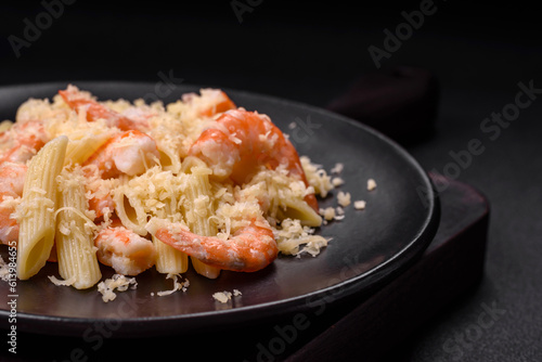 Delicious fresh penna pasta with shrimp, sauce, cheese, salt and spices