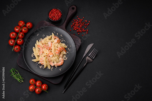 Delicious fresh penna pasta with shrimp, sauce, cheese, salt and spices