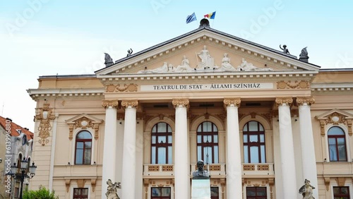 View of the Ede Szigligeti bust and State Theatre facade in Oradea downtown, Romania photo