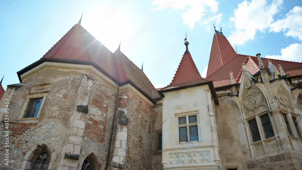 View of the Corvin Castle facade located in Hunedoara, Romania View of the Corvin Castle facade located in Hunedoara, Romania