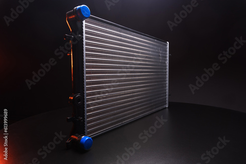 a new aluminum radiator for cooling antifreeze in the car engine