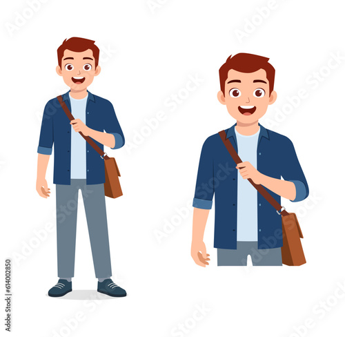 man standing holding bag and ready to go to work