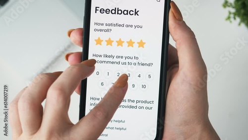 Taking a customer satisfaction survey online using a smartphone.