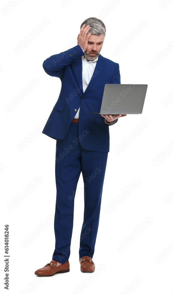 Mature businessman in stylish clothes with laptop on white background Mature businessman in stylish clothes with laptop on white background