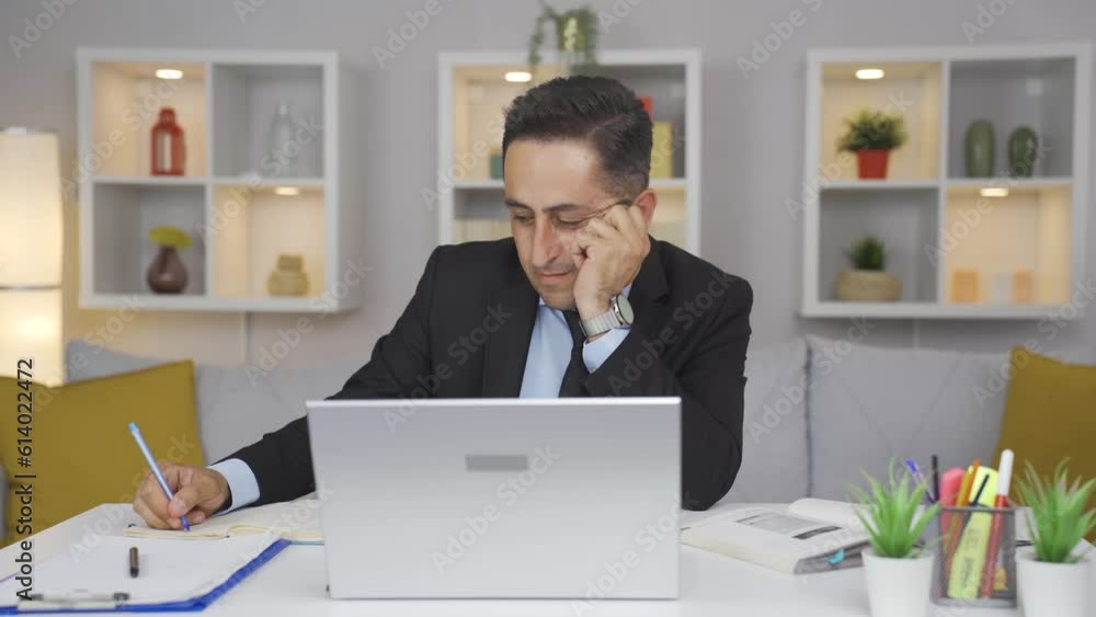 Home office worker man is tired and sleepy. Home office worker man is tired and sleepy.