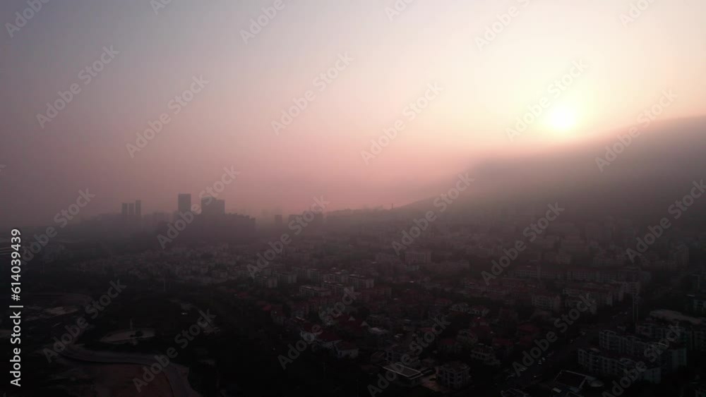 4k aerial photography of Qingdao coastline in advection fog at sunset 4k aerial photography of Qingdao coastline in advection fog at sunset