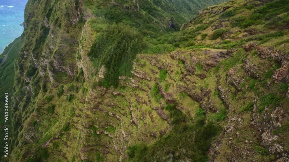 Flying Over Rocky Hawaiian Mountain Peak Flying Over Rocky Hawaiian Mountain Peak