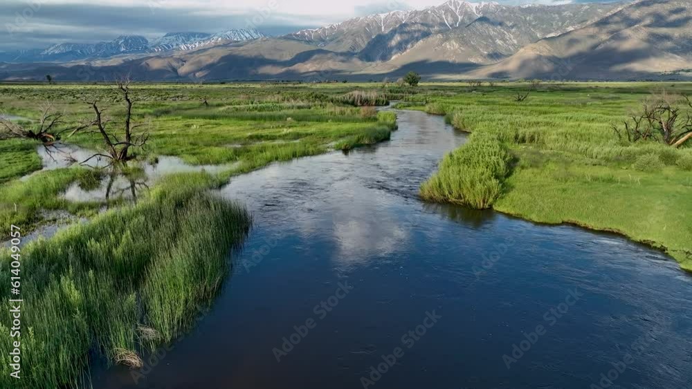 Sun and clouds reflect off Owens River Daybreak Backtrack Sun and clouds reflect off Owens River Daybreak Backtrack