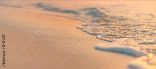 Fototapeta Naklejka Na Ścianę i Meble -  Closeup abstract sea sand beach. Soft surf waves splash panoramic freedom. Inspire tropical Mediterranean seascape. Warm gold sunset calm tranquil relaxing sunlight summer. Dream vacation background