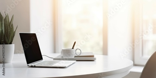 Modern Office Workspace. Laptop on a Business Desk in a Stylish Room © Bussakon