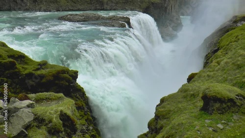 Slow motion footage of Gullfoss (Golden Waterfall) - waterfall located in the canyon of the Hvita river in southwest Iceland. photo