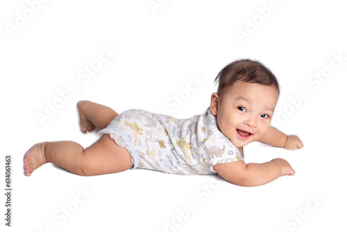 Asian baby boy lying on his tummy isolated.