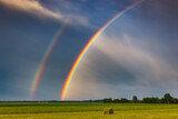 Twilight Splendor: The Mesmerizing Double Rainbow Landscape