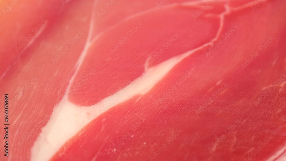 Jamon iberico macro, slider shot. Spanish ham pork for tapas Jamon iberico macro, slider shot. Spanish ham pork for tapas