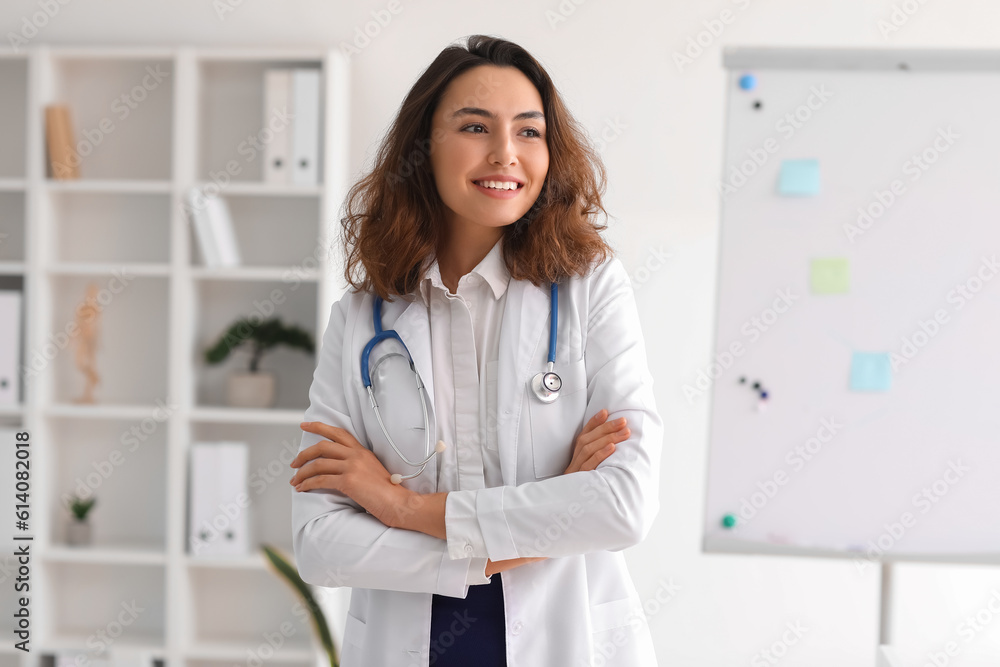 Portrait of young female doctor in clinic Portrait of young female doctor in clinic