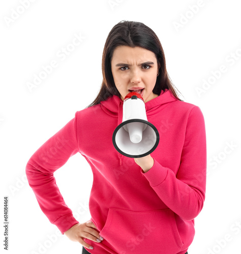 Protesting young woman with megaphone on white background