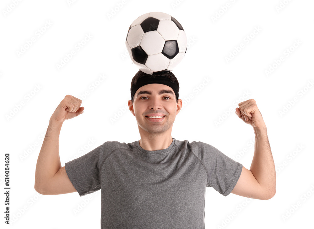 Naklejka premium Sporty young man with soccer ball on white background. Balance concept