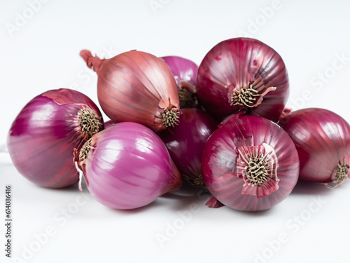 Slices of shallot onions for cooking on white background. Made with generative ai