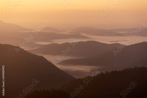 Layers of the hills during morning mist on Bijele stijene mountains, Croatia © Goran